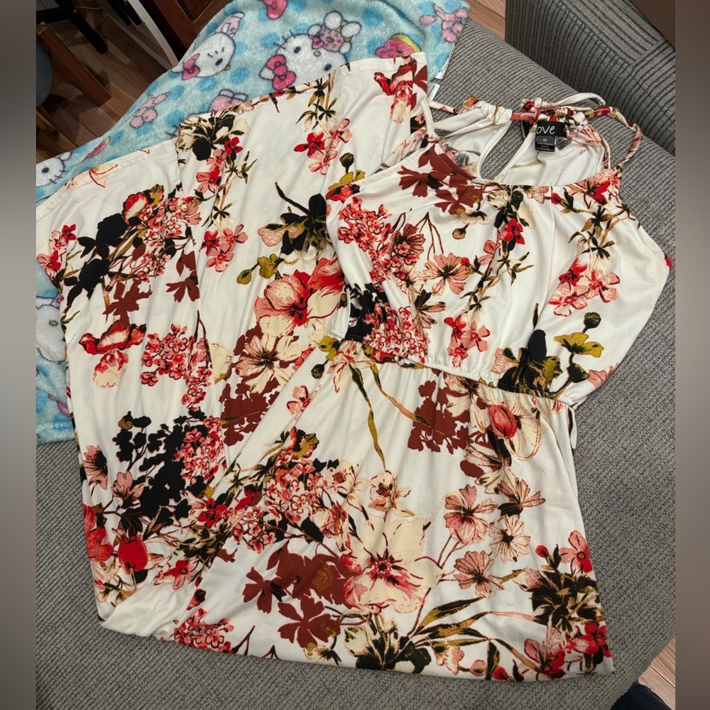Sun dress with burgundy flowers. Not body con but slim fitting.